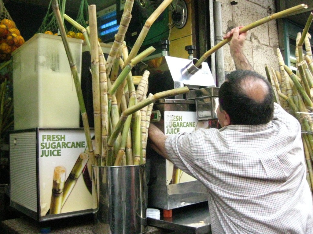 Sugarcane juice shop owner
