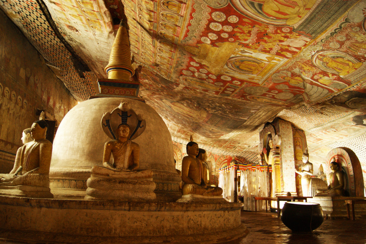 Golden Temple of Dambulla with beautiful Buddha statues and ceiling murals